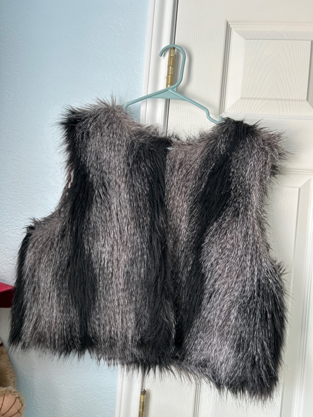 Jennifer Lopez Faux Fur Vest in Silver and Black
